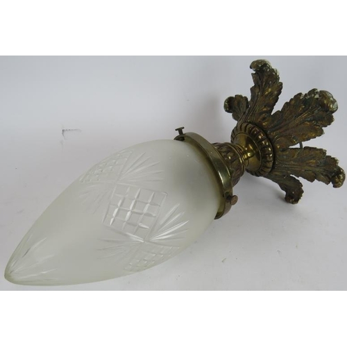 27 - An early 20th century Arts & Crafts style brass lantern with graduated milk glass shade and planishe... 