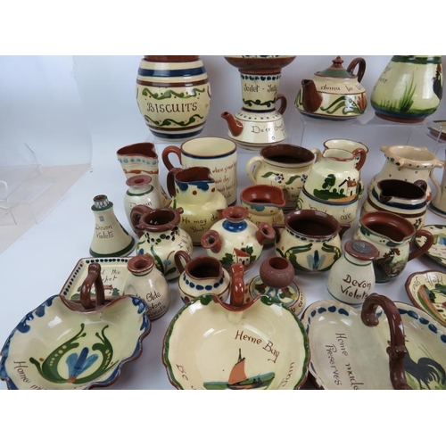 277 - A lovely and large collection of late 19th/early 20th century Devonshire Motto Ware pottery, approx:... 