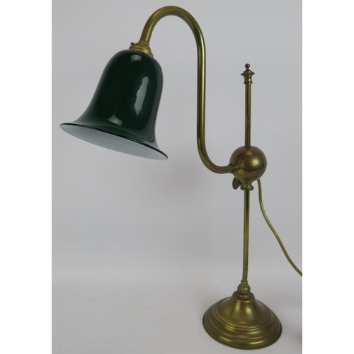 286 - A brass rise and fall desk lamp with swan neck sconce and green glass shade. Max height 67cm.
Condit... 