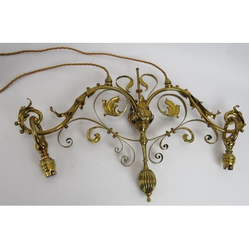 288 - A period brass Art Nouveau two lamp rise and fall ceiling light with acanthus leaf decoration. Width... 