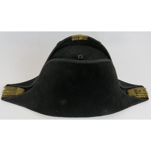 290 - A 19th century British naval officer's bicorn hat with toleware tin. Gold braided and with aperture ... 