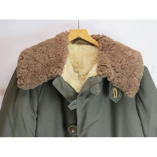 292 - A vintage Swedish army WW2 pattern M1909 coat, Mats Larsson sheepskin lined, canvas outer, horn butt... 