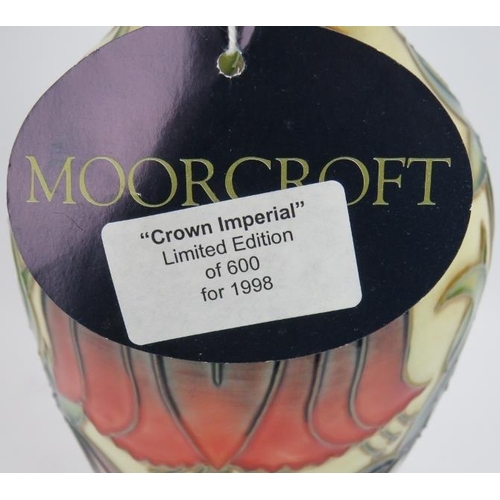 293 - A limited edition Moorcroft pottery vase in Crown Imperial pattern by Rachel Bishop. 589/600. Height... 