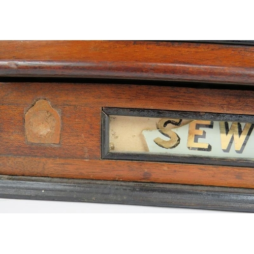 3 - A set of 19th century mahogany Ermen & Roby cotton reel shop display drawers with gilt glass panels.... 