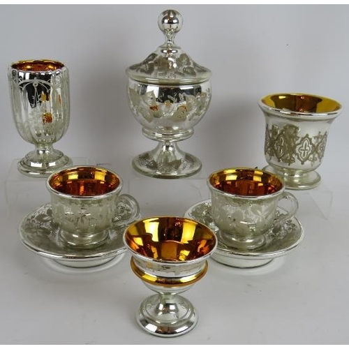 32 - Six pieces of antique continental mercury glass including two cups and saucers, three goblets and a ... 