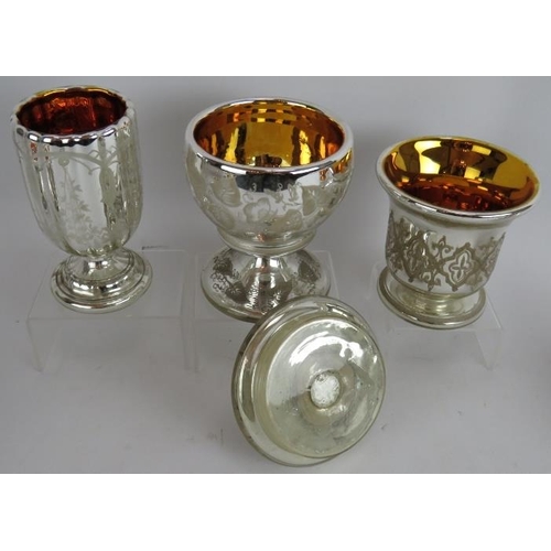 32 - Six pieces of antique continental mercury glass including two cups and saucers, three goblets and a ... 