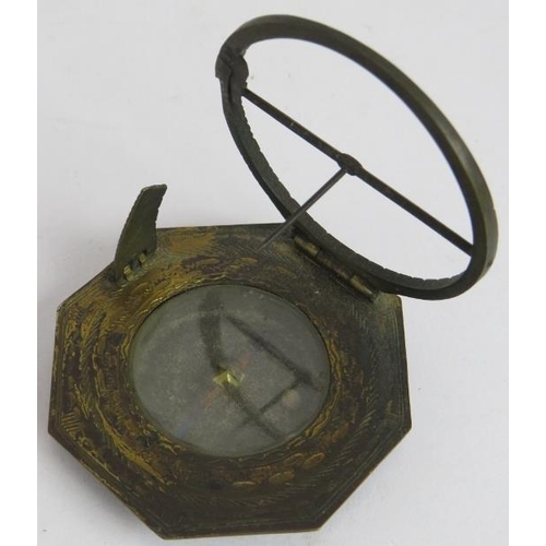 33 - An 18th century gilt brass pocket compass sundial engraved 