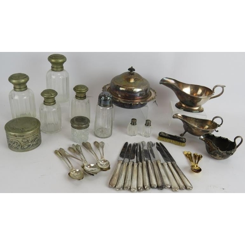 35 - A quantity of mainly silver plated wares including sauce boats, teaspoons, fruit knives, butter dish... 