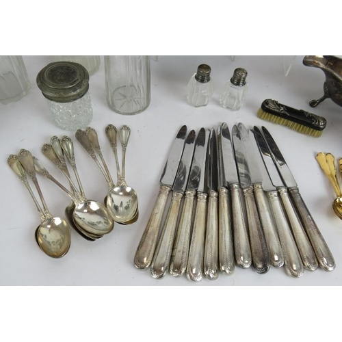 35 - A quantity of mainly silver plated wares including sauce boats, teaspoons, fruit knives, butter dish... 