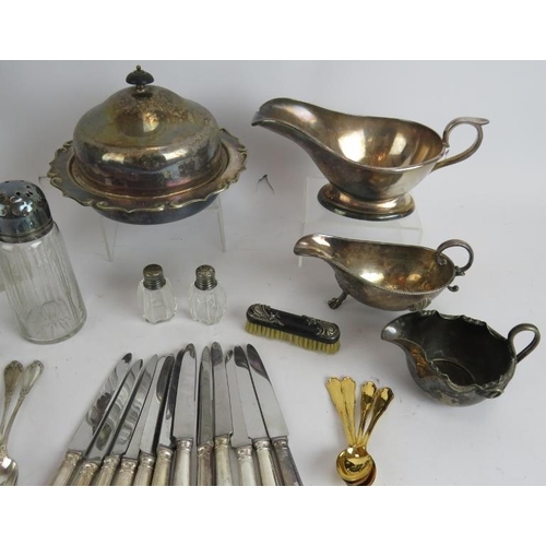 35 - A quantity of mainly silver plated wares including sauce boats, teaspoons, fruit knives, butter dish... 