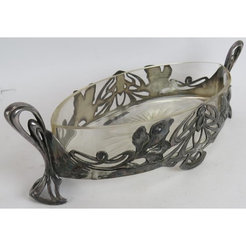 38 - An Art Nouveau glass lined pewter fruit bowl of elliptical form by Max Hacger, Austrian, marked to b... 