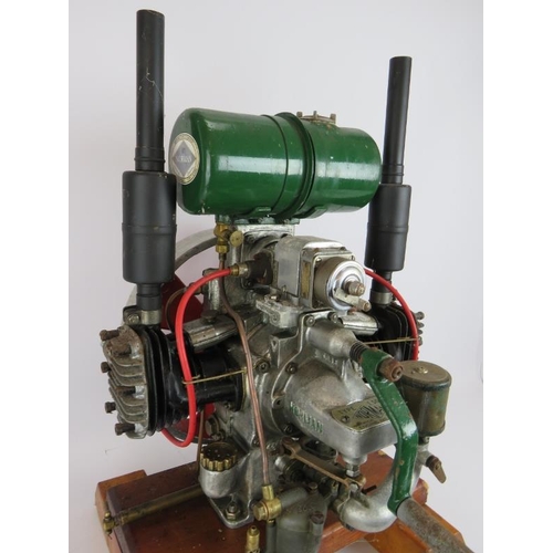 47 - A vintage Norman type T300 stationery engine on wood block mount. Height 68cm.
Condition report: Unt... 