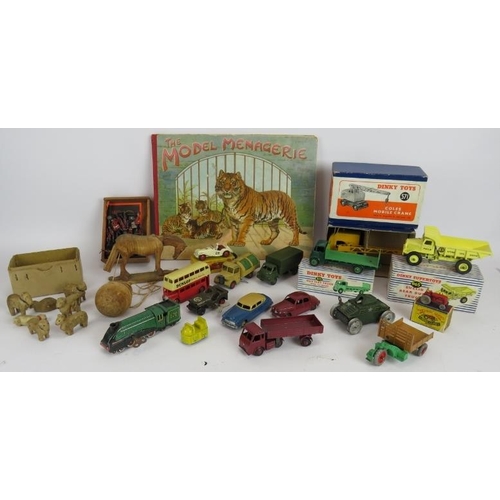 50 - A mixed lot of boxed and unboxed Dinky toys and other model cars, quantity of lead soldiers, a carve... 