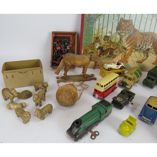 50 - A mixed lot of boxed and unboxed Dinky toys and other model cars, quantity of lead soldiers, a carve... 