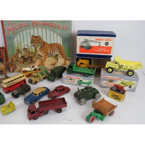 50 - A mixed lot of boxed and unboxed Dinky toys and other model cars, quantity of lead soldiers, a carve... 