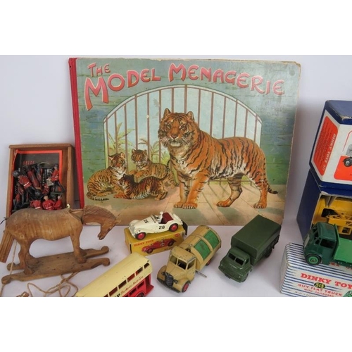 50 - A mixed lot of boxed and unboxed Dinky toys and other model cars, quantity of lead soldiers, a carve... 