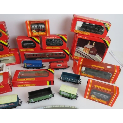 51 - A large quantity of Hornby 00 gauge railway carriages, track, rolling stock, buildings, locomotives ... 