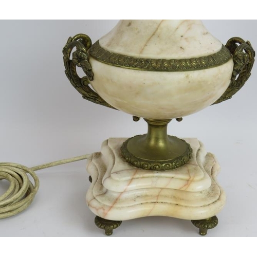 65 - A polished marble classical urn shaped table lamp with gilt brass mounts. Height 44cm.
Condition rep... 