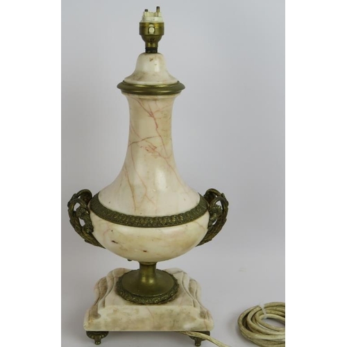 65 - A polished marble classical urn shaped table lamp with gilt brass mounts. Height 44cm.
Condition rep... 