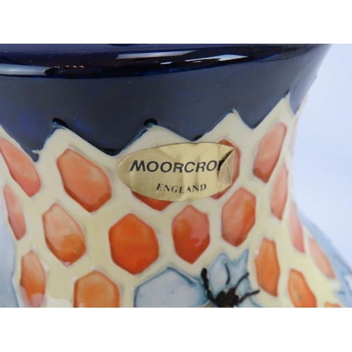 76 - A Moorcroft pottery honeycomb and bees lamp with original label and shade. Lamp base height 28cm.
Co... 