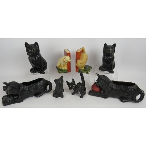 81 - Five antique Bretby pottery cats, a similar dog and a pair of Bretby bookends. Largest 26cm x 12cm. ... 