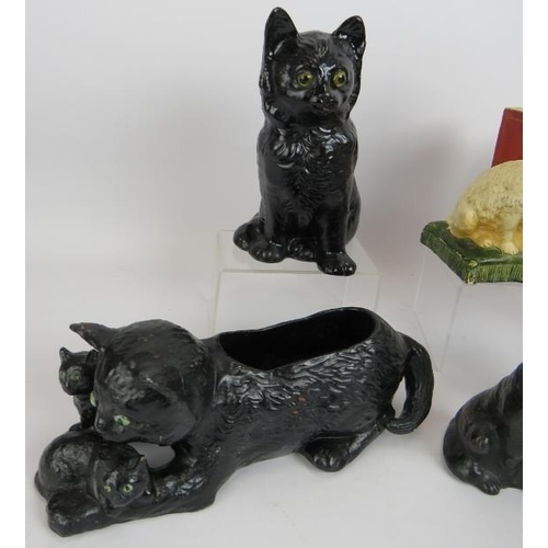 81 - Five antique Bretby pottery cats, a similar dog and a pair of Bretby bookends. Largest 26cm x 12cm. ... 