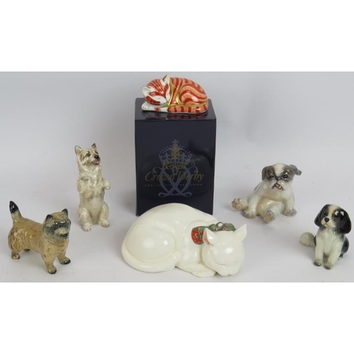 82 - A Royal Crown Derby limited edition cat, a Goebel sleeping cat, Beswick terrier, Royal Doulton terri... 