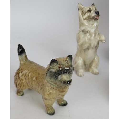 82 - A Royal Crown Derby limited edition cat, a Goebel sleeping cat, Beswick terrier, Royal Doulton terri... 