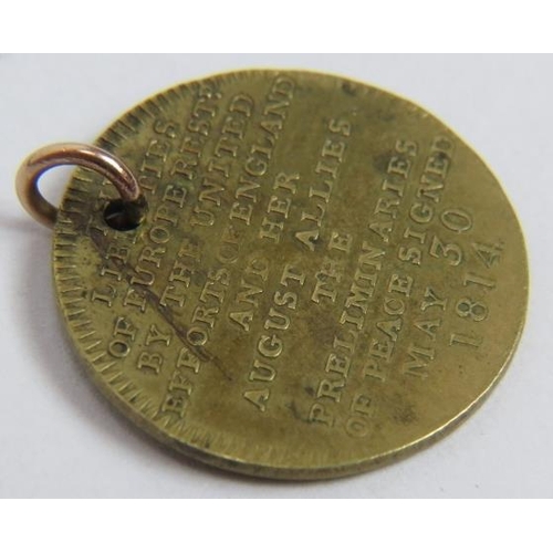 84 - A brass commemorative medallion jeton, 1814 Peace of Paris, designed by William Kettle. Gilt brass o... 