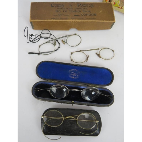 86 - Mixed collectables to include an antique brass three draw telescope, 4 pairs of spectacles, a Metrop... 