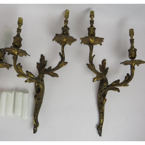 87 - Two pairs of good quality gilt brass rococo acanthus leaf double branch wall sconces with white glas... 