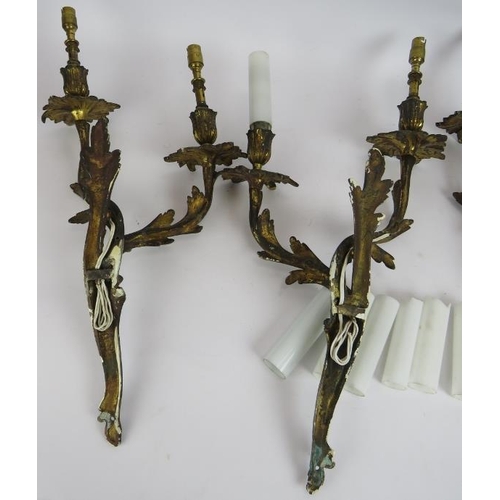 87 - Two pairs of good quality gilt brass rococo acanthus leaf double branch wall sconces with white glas... 