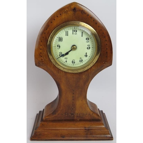 88 - A walnut cased Art Nouveau mantel clock with delicate foliate inlay. No key. Height 31cm.
Condition ... 