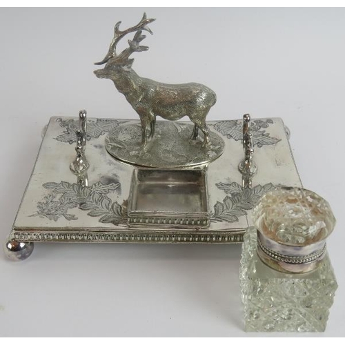 9 - A late 19th century silver plated inkstand with stag mount, a gold plated pocket watch with leather ... 