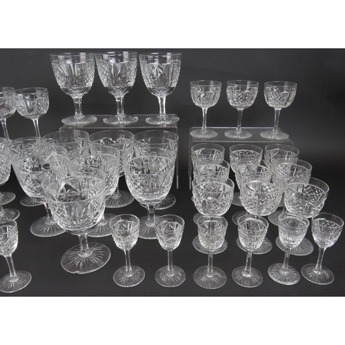 92 - A large suite of Edinburgh crystal E&L drinking glasses including 10 red wine, 10 white wine, 11 she... 