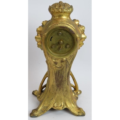 98 - An antique Art Nouveau French gilt metal clock with case designed by C Bonnefond. Height 31.5cm.
Con... 