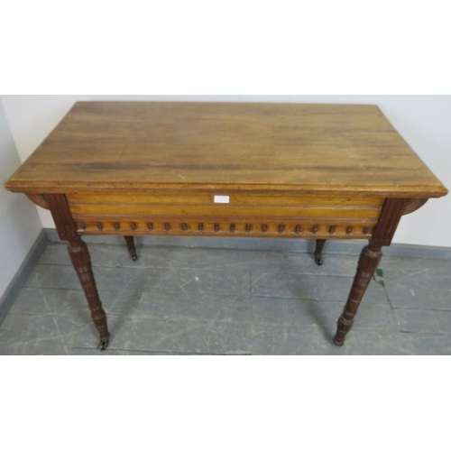 706 - An Aesthetic Movement walnut side table in the manner of Debenham & Hewett, the under-frame with mou... 