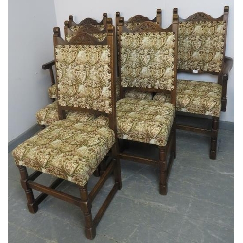 714 - A set of six (4+2) reproduction oak dining chairs in the manner of Titchmarsh & Goodwin, upholstered... 