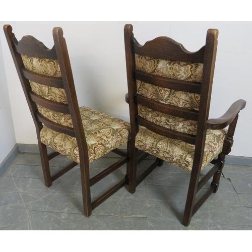 714 - A set of six (4+2) reproduction oak dining chairs in the manner of Titchmarsh & Goodwin, upholstered... 