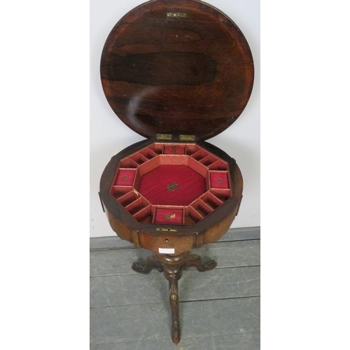 728 - A Victorian rosewood trumpet/work table, the circular lid opening onto an array of lidded compartmen... 