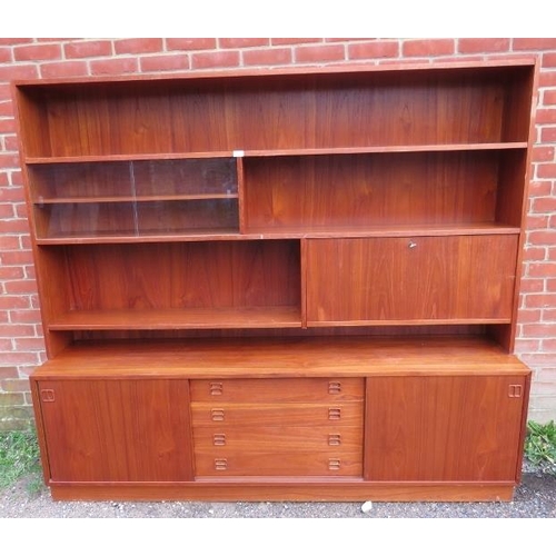 732 - A mid-century Danish teak wall unit by Sejling Skabe, the top section with fall front bureau and fit... 