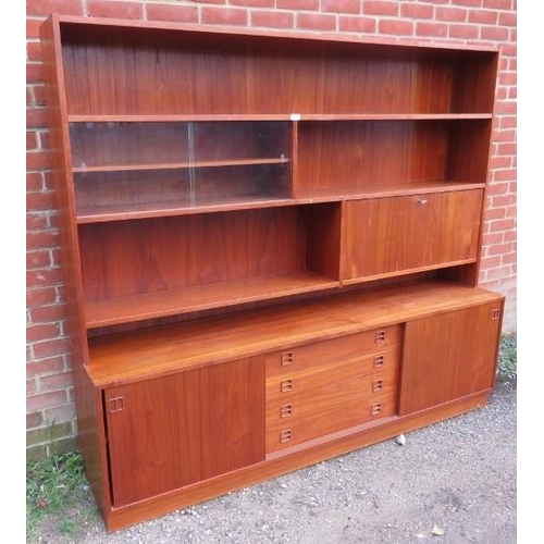 732 - A mid-century Danish teak wall unit by Sejling Skabe, the top section with fall front bureau and fit... 