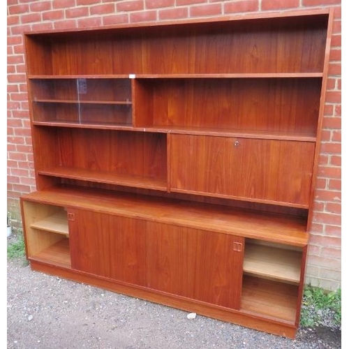 732 - A mid-century Danish teak wall unit by Sejling Skabe, the top section with fall front bureau and fit... 