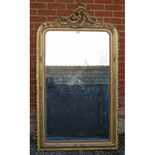 733 - A large 19th century French over mantle mirror, in an ornate gilt gesso frame with beaded edging and... 