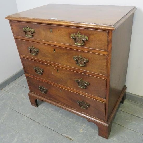 735 - A Georgian mahogany chest of small proportions, housing four long graduated cock-beaded drawers with... 