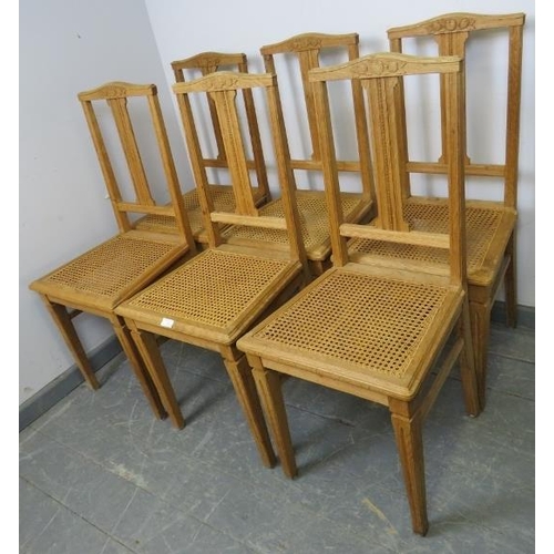 736 - A set of six turn of the century light oak Swiss provincial dining chairs, with reeded and carved ba... 