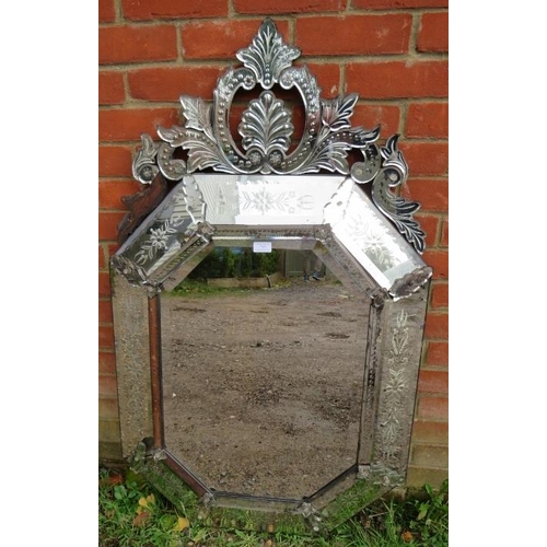 737 - A large 19th Century Venetian mirror, with shell cornice amidst acanthus scrolls and sectioned bevel... 