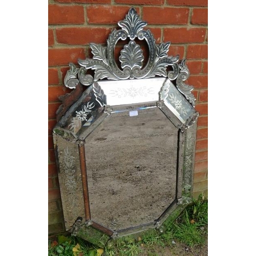 737 - A large 19th Century Venetian mirror, with shell cornice amidst acanthus scrolls and sectioned bevel... 