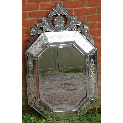 737 - A large 19th Century Venetian mirror, with shell cornice amidst acanthus scrolls and sectioned bevel... 