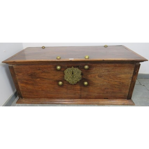 743 - A 19th century hardwood Zanzibar chest, featuring brass boss stud decoration, ornate pierced brass l... 